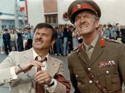 Eli Wallach And David Niven: Le Cerveau, 1969 by Marcel Dole Pricing Limited Edition Print image