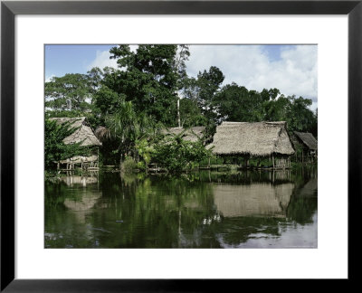 Building On Stilts Reflected In The River Amazon, Peru, South America by Sybil Sassoon Pricing Limited Edition Print image