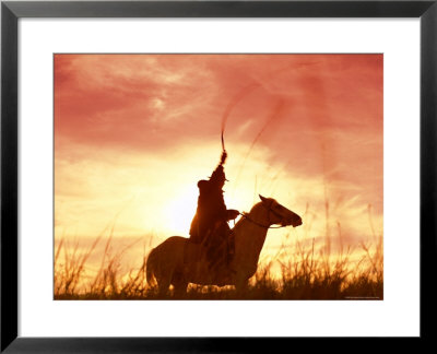 Profile Of A Stockman On A Horse Against The Sunset, Queensland, Australia, Pacific by Mark Mawson Pricing Limited Edition Print image