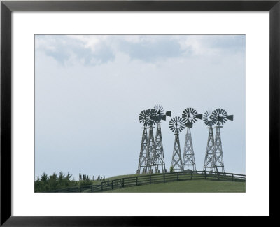 Cluster Of Windmills Rises Over The Rolling Countryside by Tom Murphy Pricing Limited Edition Print image