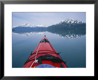 Kayak Plies Calm Waters Where Mountains Seem To Meet The Water by Bill Hatcher Pricing Limited Edition Print image