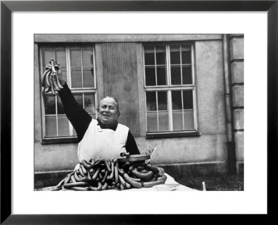 Vendor Trying To Sell Bundles Of Sausage by Margaret Bourke-White Pricing Limited Edition Print image