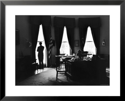 President John F. Kennedy And Attorney Gen. Robert F. Kennedy In The Oval Office At The White House by Art Rickerby Pricing Limited Edition Print image