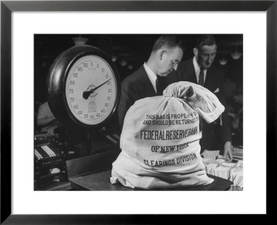 Bag Of Checks Being Weighed On Scale At Bank by Herbert Gehr Pricing Limited Edition Print image
