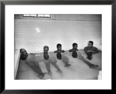 African-American Arthritis Patients Receiving Treatment In Hot Wath Baths At Spa by Alfred Eisenstaedt Pricing Limited Edition Print image