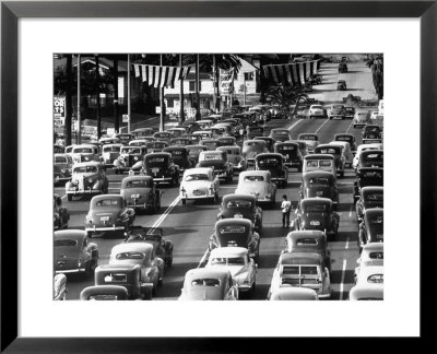 Traffic Traveling On Figueroa And Sunset Street by Loomis Dean Pricing Limited Edition Print image