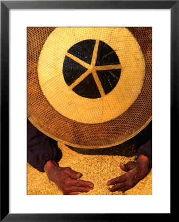 Farmer Wearing A Bamboo Hat Gathering Rice, Guizhou, China by Keren Su Pricing Limited Edition Print image