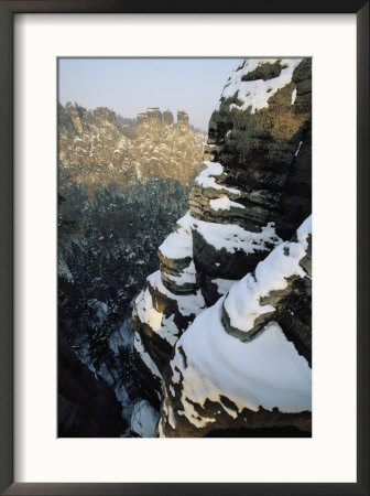 Cliffs With Snow-Covered Ledges by Norbert Rosing Pricing Limited Edition Print image
