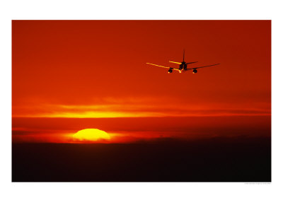 Airplane In Flight In View Of The Setting Sun by Peter Walton Pricing Limited Edition Print image