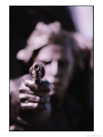 A Pistol Barrel Points Directly At The Camera In This Close-View Of A Statue At Gettysburg by Stephen St. John Pricing Limited Edition Print image