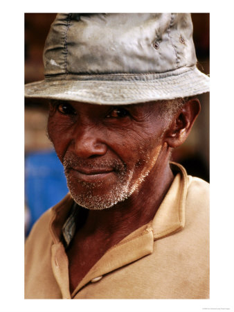 Man In Hat, Antsirabe, Madagascar by Tom Cockrem Pricing Limited Edition Print image