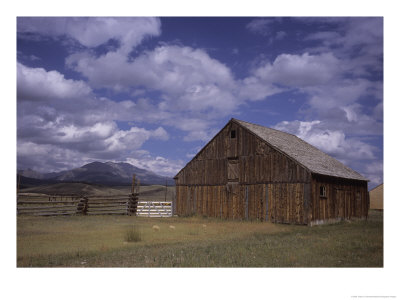 The Ruins Of A Farm Sit In A Plains With Mountains Visible, Central Colorado by Taylor S. Kennedy Pricing Limited Edition Print image