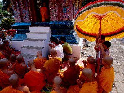 Buddhist Monks At Wat Xiengthong, Lunar New Year, Luang Prabang, Laos by Alain Evrard Pricing Limited Edition Print image