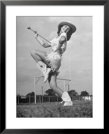 Kilgore Junior College Rangerette Marching With Her Baton by Joe Scherschel Pricing Limited Edition Print image