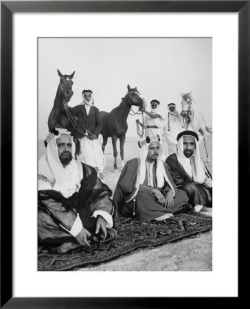 Sheikh Sir Sulman Bin Hamad Sitting With His Oldest Son by Walter Sanders Pricing Limited Edition Print image