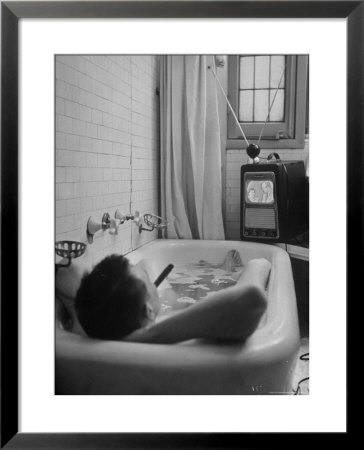 Writer Russell Finch Taking Portable Television Set To Bathroom During His Bath by George Skadding Pricing Limited Edition Print image