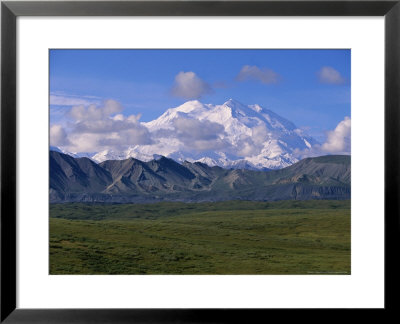 Mt. Mckinley And Cumulus Clouds In Late Morning Light by John Eastcott & Yva Momatiuk Pricing Limited Edition Print image