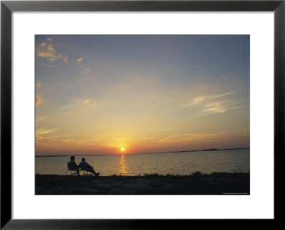 Elderly Couple Enjoy Watching A Sunset by Klaus Nigge Pricing Limited Edition Print image