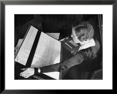 Woman Working In The Hearst Accounting Office by Peter Stackpole Pricing Limited Edition Print image