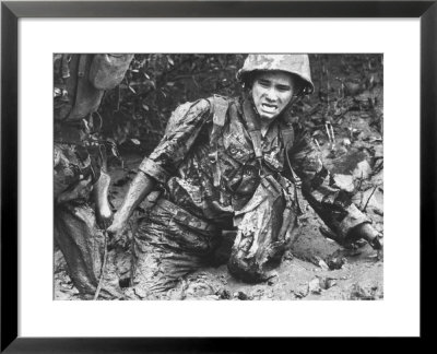 Marine Sinking Into Mud by Larry Burrows Pricing Limited Edition Print image