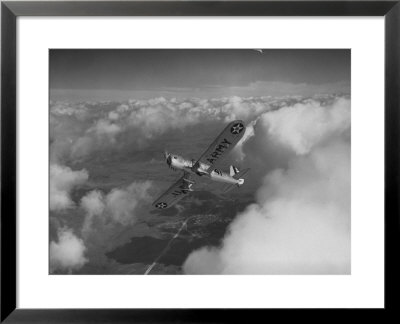 Us Army's Ryan, Dragonfly, Yo-51 Observation Plane Soaring Above The Clouds by Peter Stackpole Pricing Limited Edition Print image