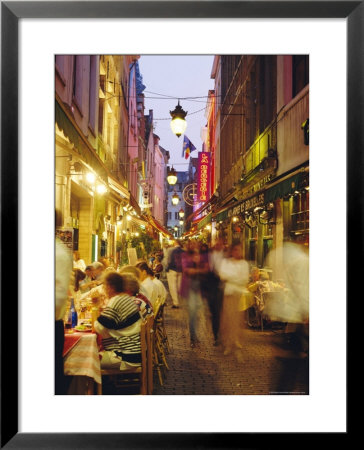 Restaurants In The Rue Des Bouchers, Brussels, Beljium by Nigel Francis Pricing Limited Edition Print image