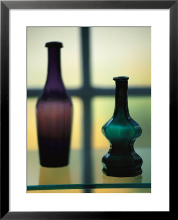 Colored Glass Bottles Are Displayed In The Sandwich Glass Museum by Michael Melford Pricing Limited Edition Print image