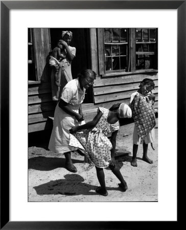 Nurse-Midwife Maude Callen Chatting With 8 And 9 Year Old Sisters Carrie And Mary Jane Covington by W. Eugene Smith Pricing Limited Edition Print image