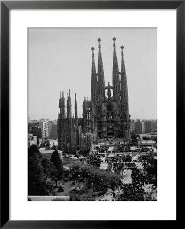 Crowds Gathering Outside The Sagrada Familia Church by Dmitri Kessel Pricing Limited Edition Print image