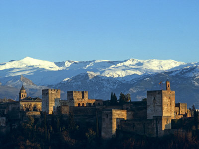 The Alhambra And The Sierra Nevada Behind Are Lit By A Wintry Sunset, Spain by Tor Eigeland Pricing Limited Edition Print image