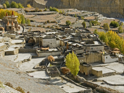 Village With Buddhist Chortens In Mustang, Nepal by Stephen Sharnoff Pricing Limited Edition Print image