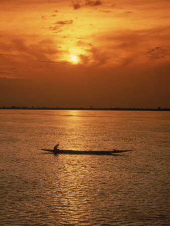 Man And Pirogue, Sunset, Niger River, Mali, West Africa by Bob Burch Pricing Limited Edition Print image
