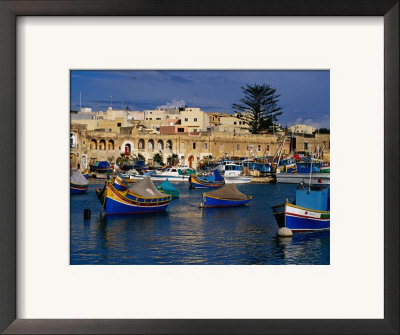 Luzzus, Traditional Fishing Boats Moored In Harbour, Marsaxlokk, Malta by Pershouse Craig Pricing Limited Edition Print image