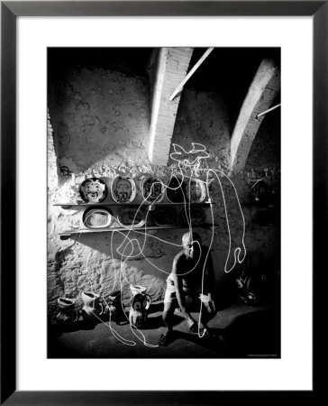 Pablo Picasso Drawing A Centaur In The Air With A Flashlight At Madoura Pottery by Gjon Mili Pricing Limited Edition Print image