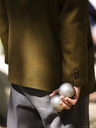 Man Holding Petanque Boules During A Game by Gavin Gough Pricing Limited Edition Print image