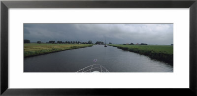 Motorboat In A Canal, Friesland, Netherlands by Panoramic Images Pricing Limited Edition Print image