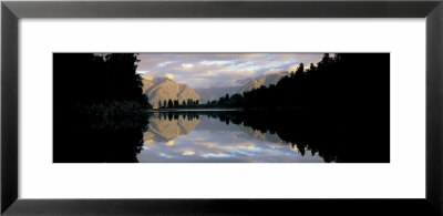 Reflection Of Mountains And Trees In Water, Lake Matheson, South Island New Zealand, New Zealand by Panoramic Images Pricing Limited Edition Print image