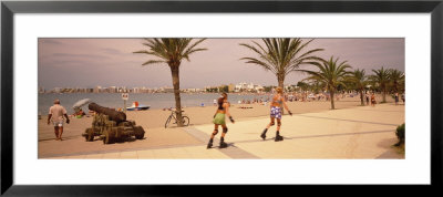 Two Women Inline Skating, Tossa Del Mar Beach, Spain by Panoramic Images Pricing Limited Edition Print image