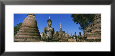 Statue Of Buddha In A Temple, Wat Mahathat, Sukhothai, Thailand by Panoramic Images Pricing Limited Edition Print image