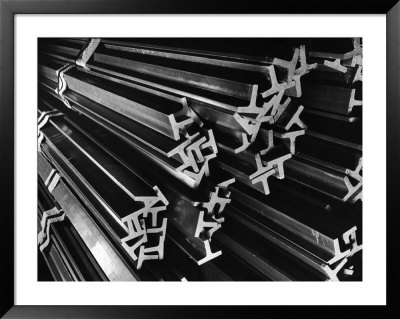Bundled Aluminum T-Beams Stacked In At Aluminum Company Of America Factory by Margaret Bourke-White Pricing Limited Edition Print image
