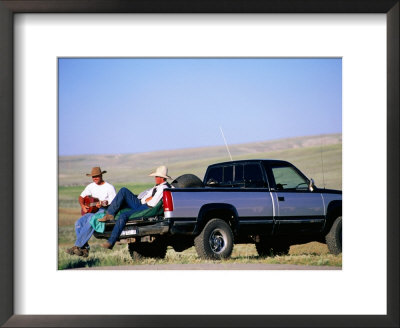 Cowboy Musicians On Back Of Pick-Up Truck, Near South Pass, Wyoming by Holger Leue Pricing Limited Edition Print image
