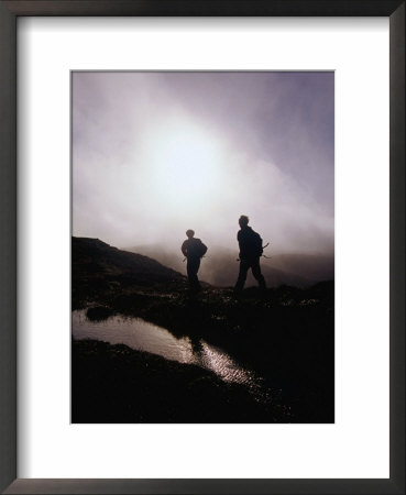 Walkers In Mist On Diamond Hill In Connemara National Park, Connemara, Ireland by Gareth Mccormack Pricing Limited Edition Print image