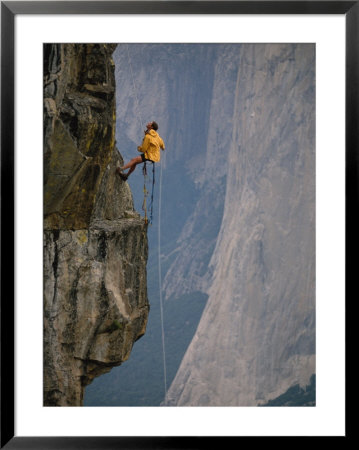 Rapeling Down A Cliff With El Capitan In Background, Yosemite National Park, California by Bill Hatcher Pricing Limited Edition Print image