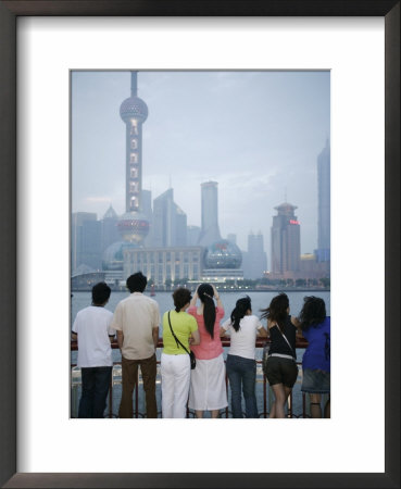 People On The Bund Looking At The Oriental Pearl Tower In Pudong District, Shanghai, China, Asia by Angelo Cavalli Pricing Limited Edition Print image