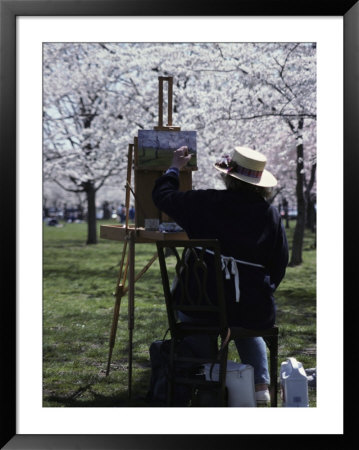 An Artist Paints A Landscape Of Blossoming Japanese Cherry Trees by Stephen St. John Pricing Limited Edition Print image
