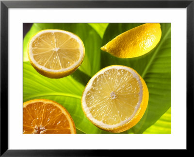 Citrus Fruits On Banana Leaves by Christophe Madamour Pricing Limited Edition Print image