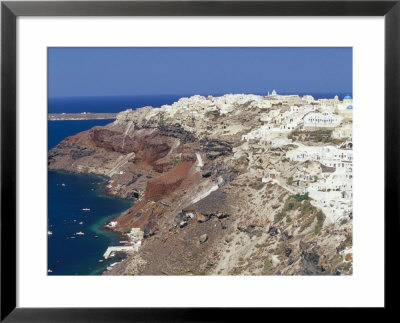 Aerial View Of Oia Village And Coastline, Oia, Santorini (Thira), Cyclades Islands, Greece by Marco Simoni Pricing Limited Edition Print image