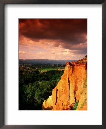Red Ochre Cliffs Beneath Stormy Sky, Roussillon, Provence-Alpes-Cote D'azur, France by David Tomlinson Pricing Limited Edition Print image