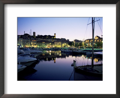 View Across Harbour To The Old Quarter Of Le Suquet, At Dusk, Cannes, French Riviera, France by Ruth Tomlinson Pricing Limited Edition Print image