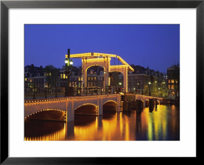 Magere Bridge Illuminated In The Evening, Amsterdam, Holland (The Netherlands), Europe by Roy Rainford Pricing Limited Edition Print image